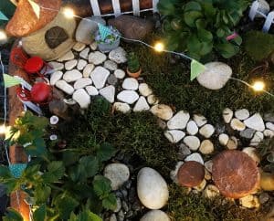 Fairy Garden from over head at night with little fiary lights.