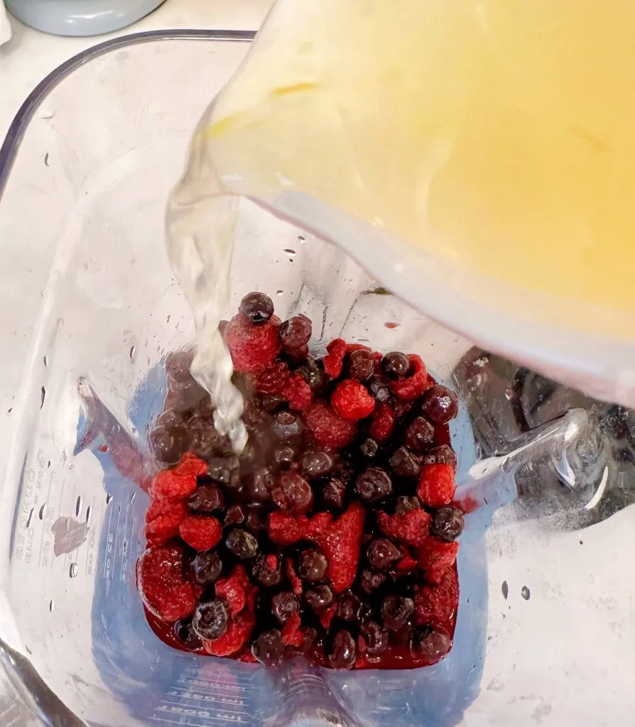 Add the lemon mixture to the berries in a blender.