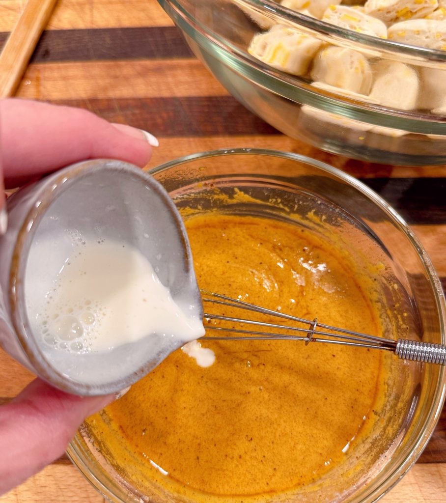 Mixing "Pumpkin Batter" for monkey bread in a small bowl.