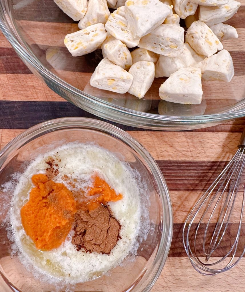 Ingredients for pumpkin bubble bread in a bowl ready to create pumpkin bread recipe.