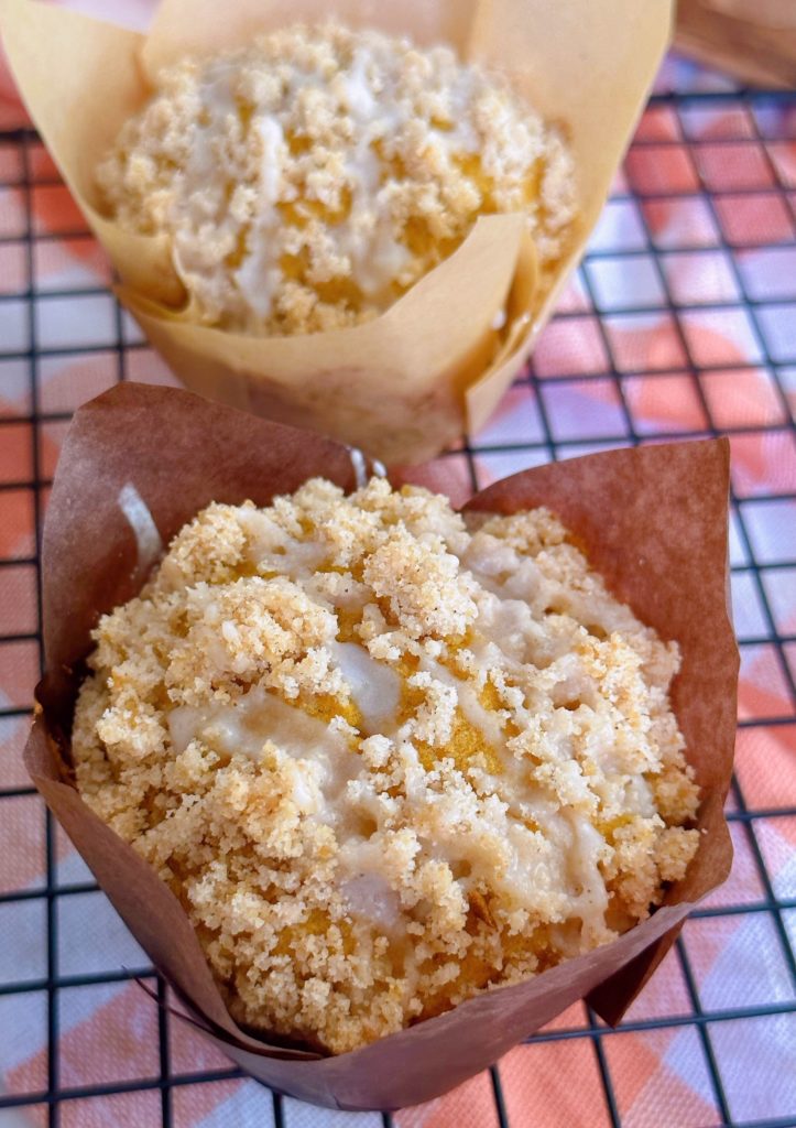 Glaze covered pumpkin streusel muffins.