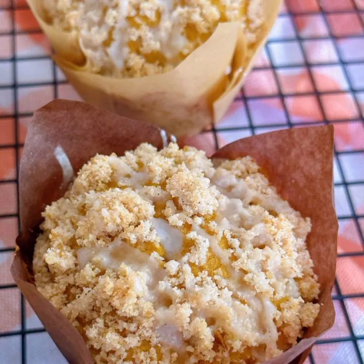 Glaze covered pumpkin streusel muffins.