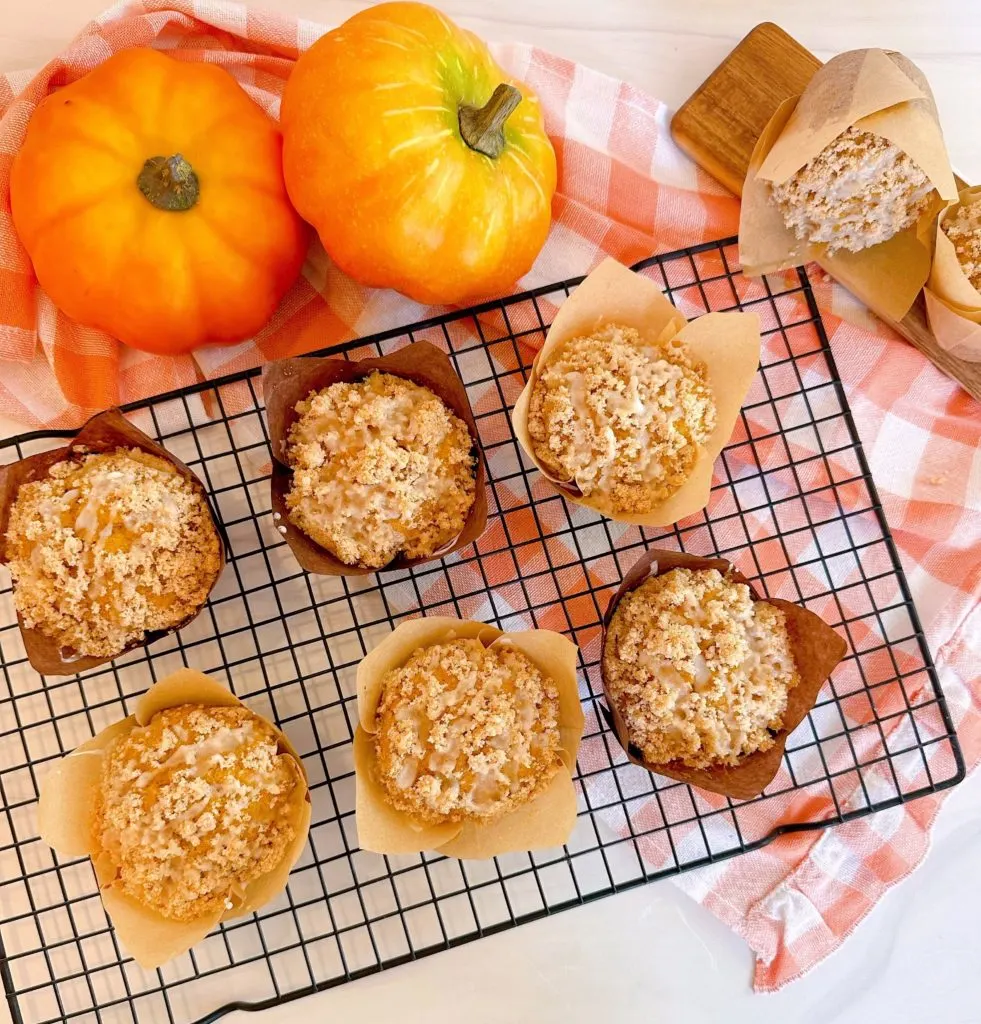 Perfect pumpkin muffins on a cooling rack. 