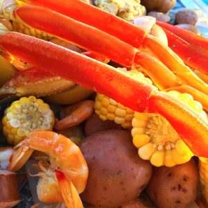 Shrimp and Crab Boil spread out on the table