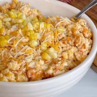 Frito Corn Salad in a white bowl up close.