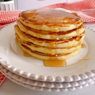 Stack of beautiful fluffy buttermilk pancakes.