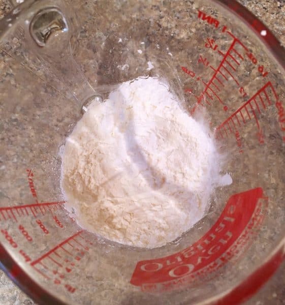 Cornstarch in measuring cup