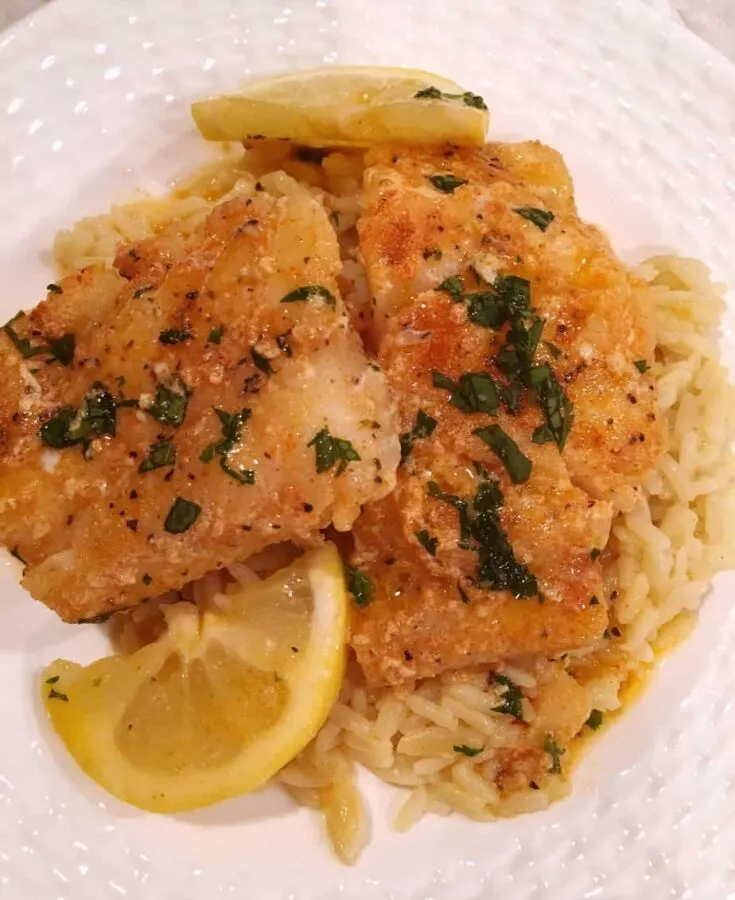 https://www.norinesnest.com/wp-content/uploads/2019/01/Cod-in-Lemon-Butter-Sauce-2018-7-e1584739433681.jpg.webp