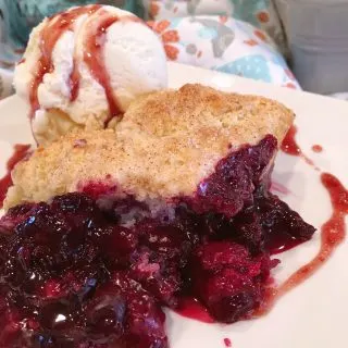 Scoop of Ultimate Berry Cobbler a la mode