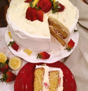 Lemon Chiffon Cake with a slice on a plate