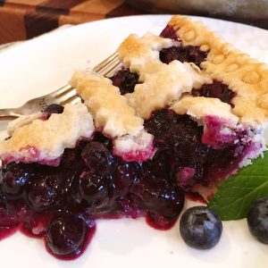 Slice of fresh blueberry pie