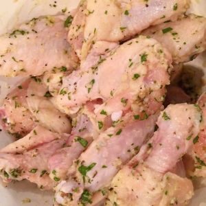 Garlic Parmesan Marinade on chicken wingettes.