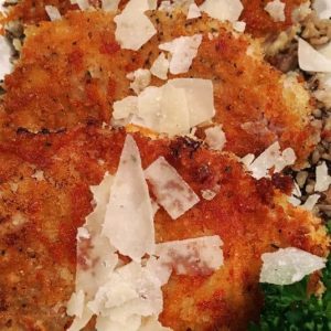 Pork chops with a crust and parmasan cheese