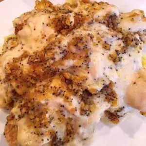 Plate full of Poppyseed chicken on mashed potatoes