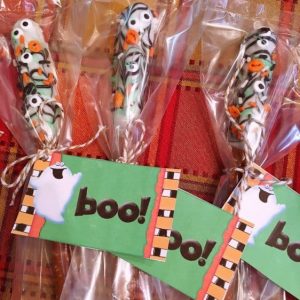 Halloween Caramel Chocolate Pretzel Sticks tagged and ready to go