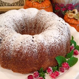 Holiday Pumpkin Cranberry Bundt Cake with garnish