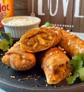 Sticky Buffalo Chicken Egg Rolls with blue cheese dipping sauce