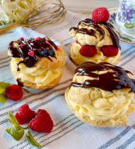 Delicious Cream Puffs with Vanilla Custard and Chocolate Ganache Drizzle