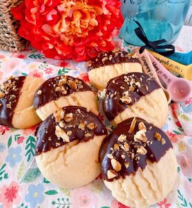 Pile of chocolate dipped sugar cookies.