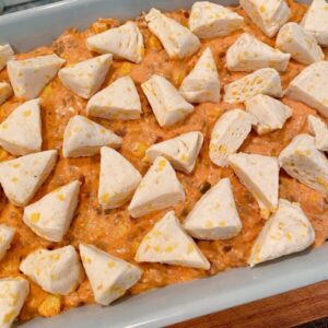 Cut up biscuits placed on top of the casserole.