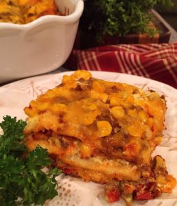 Easy Mexican Lasagna on a plate ready to eat.