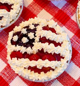 No Bake Cheesecake on a red checked cloth.