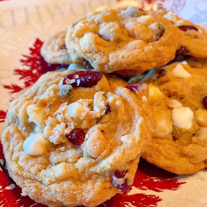 Plate full of Cranberry White Chocolate Chip Macadamia Cookies.