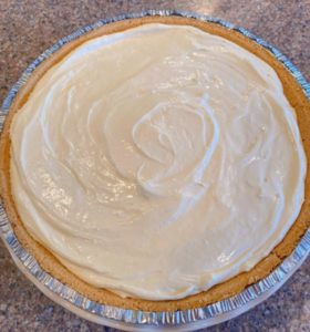 Pouring Filling into Pie Crust and chill.