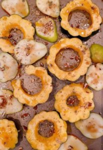 Squash and Pears sliced on a baking sheet.