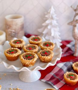 Peanut Butter Cup Christmas Cookies on a white platter.