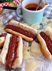 Copy Cat Air Fryer J. Dawgs on buns with chips and extra sauce.