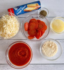 Homemade Calzone Ingredients on a white board.