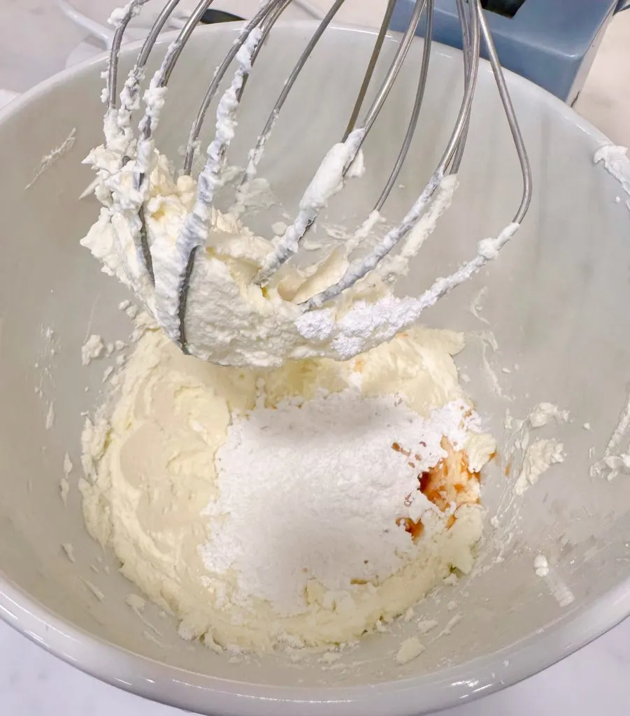 Mixing cream cheese layer.