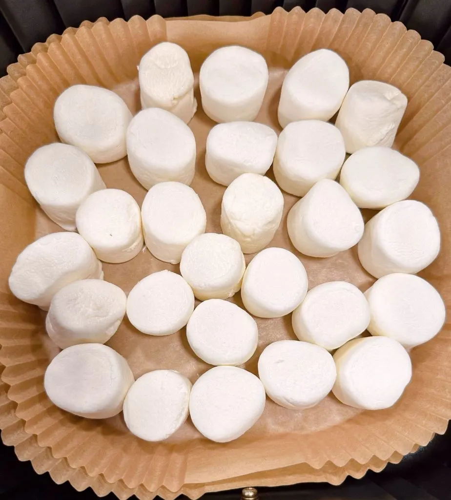 A double silicone air fryer liner filled with marshmallows.