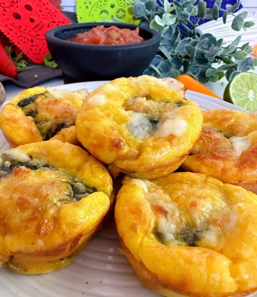 Baked Stuffed Chile Bites in a pile on a plate.