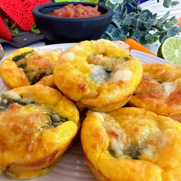 Baked Stuffed Chile Bites in a pile on a plate.