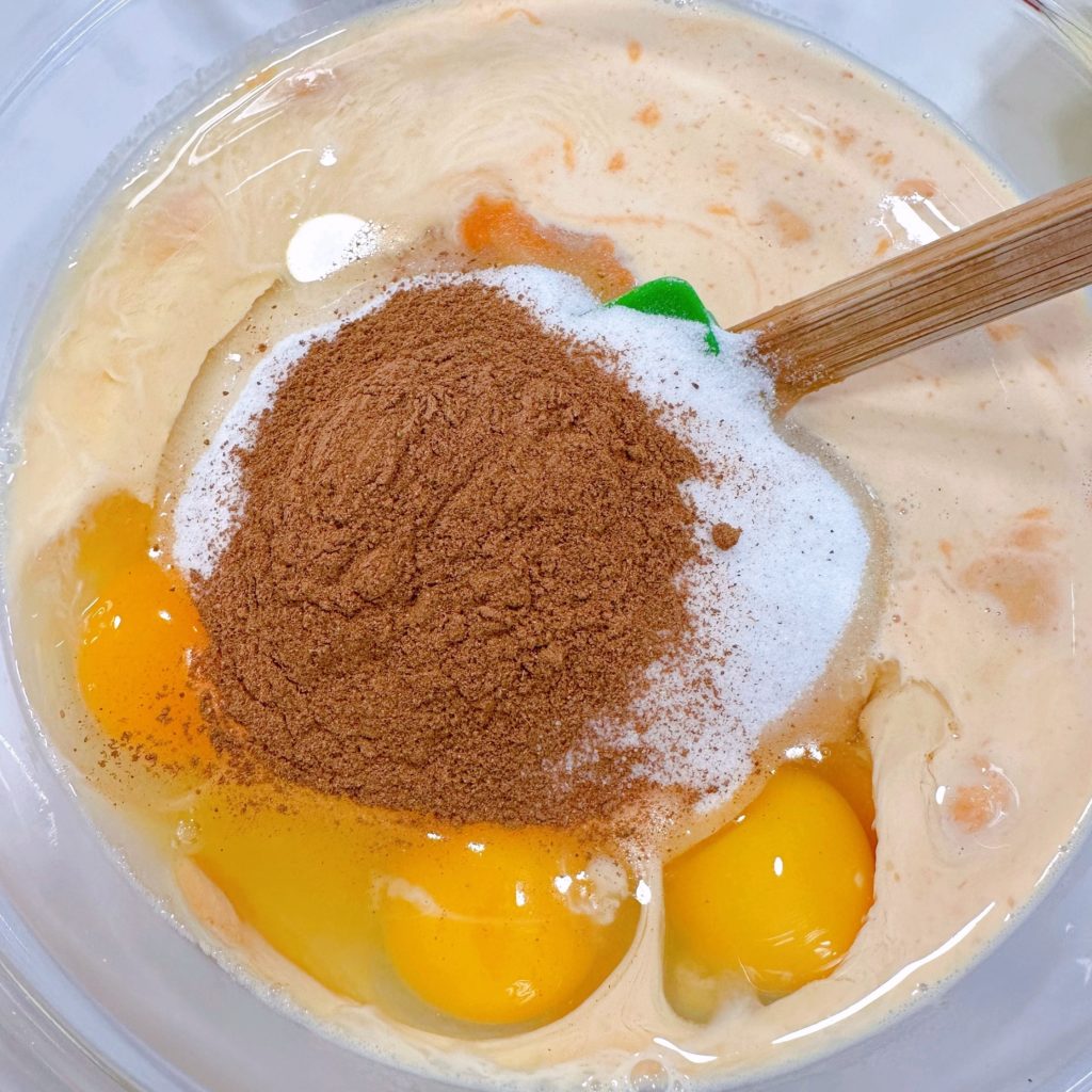 Pumpkin filling layer ingredients in a large bowl.