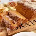 Sweet Potato Cinnamon Bread sliced and on a cutting board.