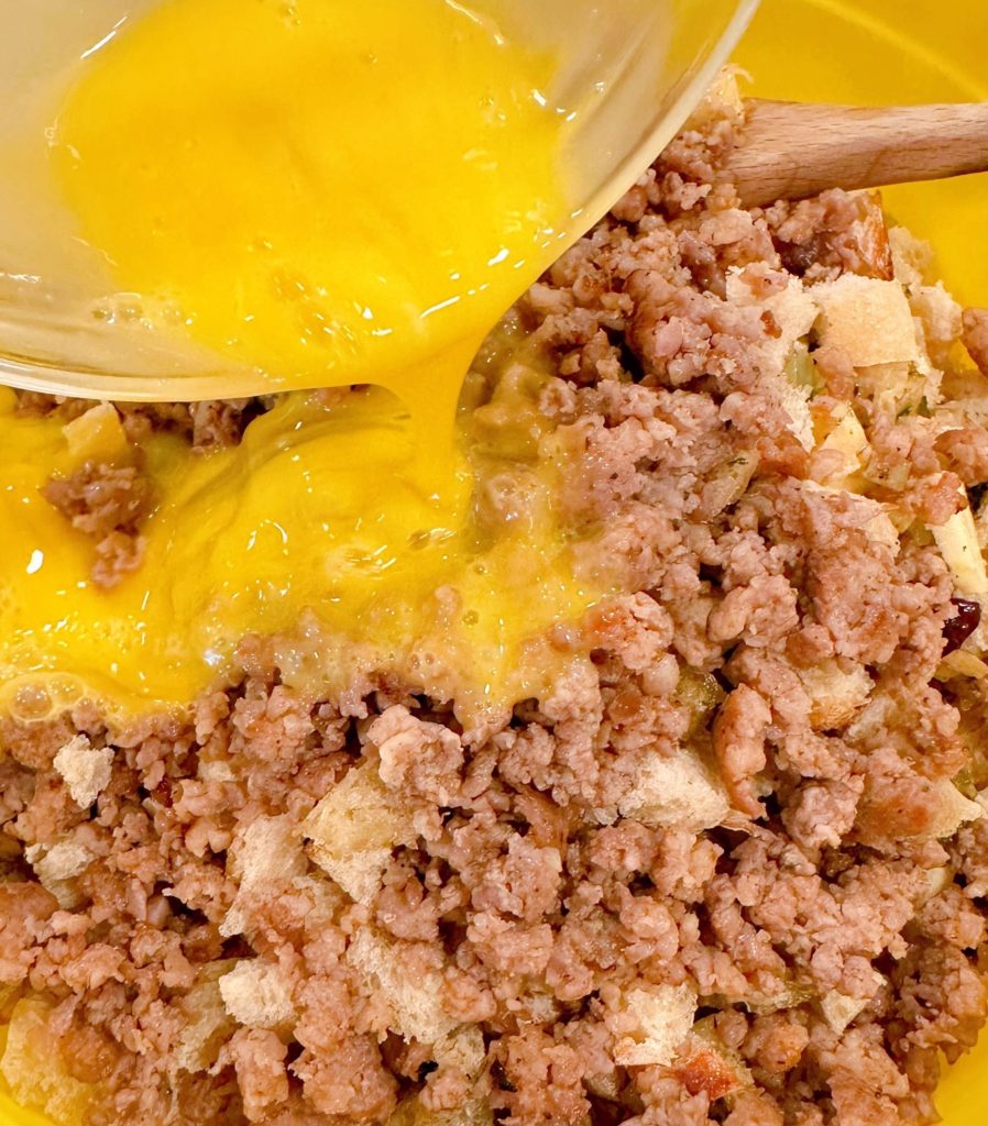 Add the sausage and egg to the stuffing mixture.