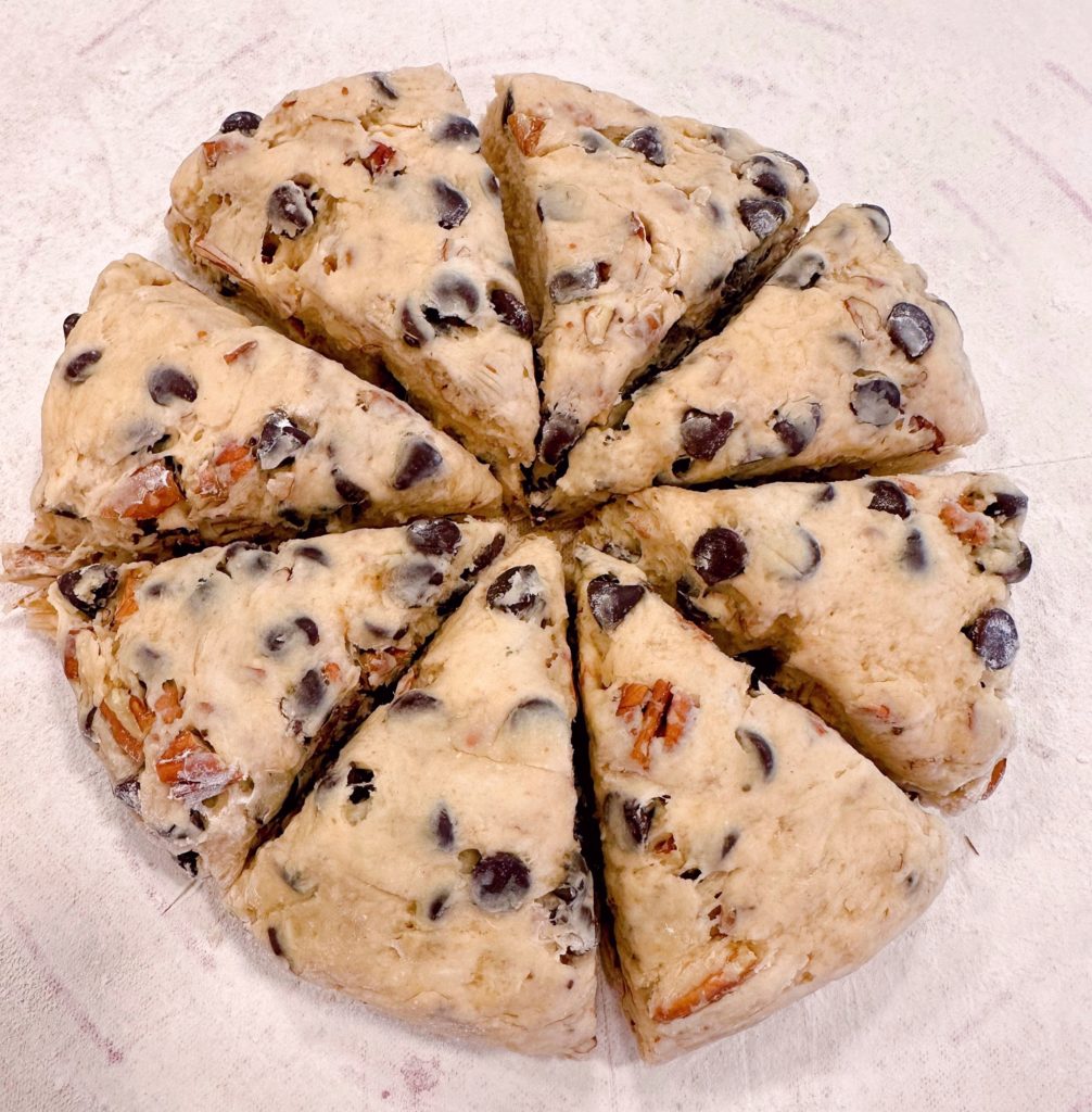 Scone dough cut into 8 wedges.