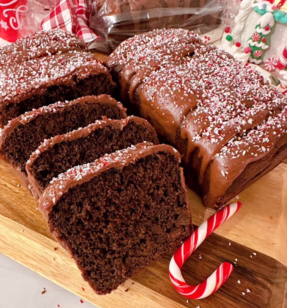 Peppermint chocolate cake loaf, sliced and ready to serve.