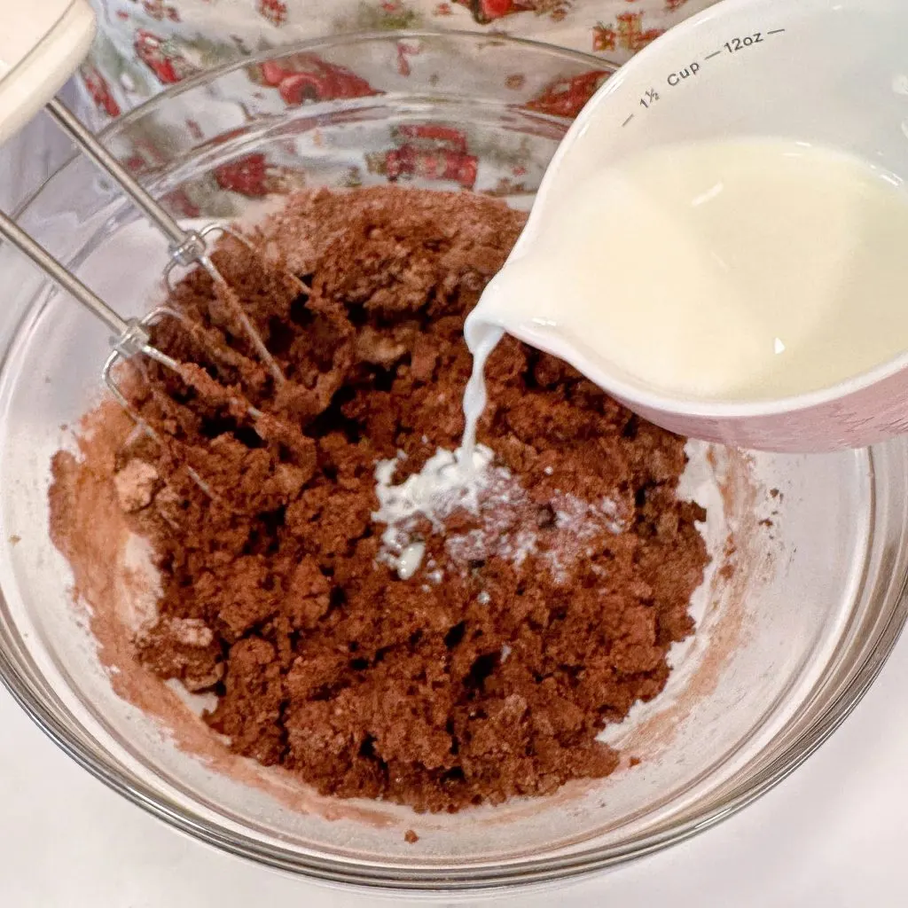 Add milk into the chocolate batter.