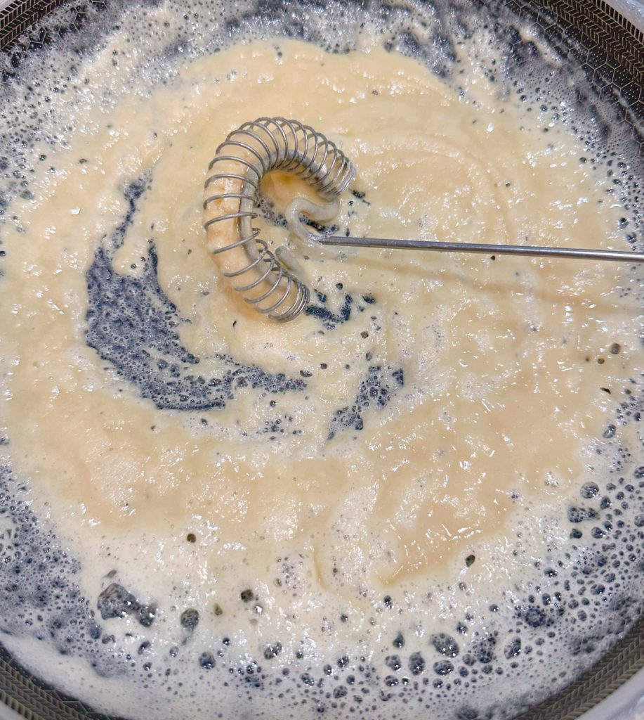 Whisk flour into melted butter.