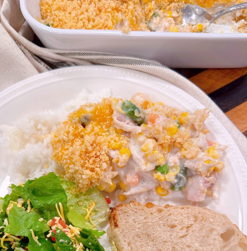 Amish chicken and corn casserole with salad and crusty bread.