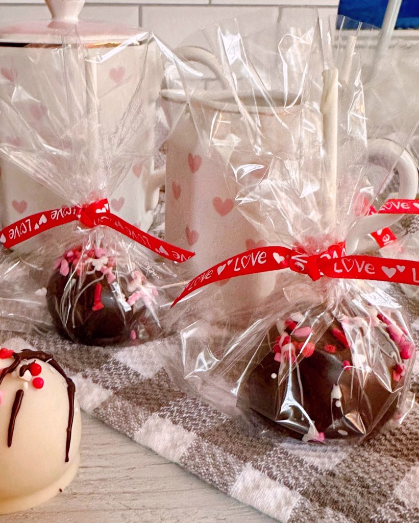 Cake pops wrapped in bags and tied with a cute ribbon.