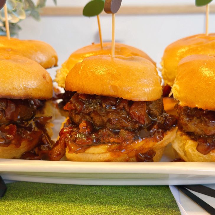 Whiskey Bacon Onion Burgers on a serving plate.