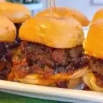 Whiskey Bacon Onion Sliders up close with lots of Bacon burger sauce.