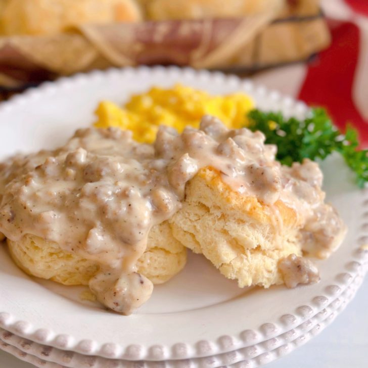 Sausage Gravy on top of biscuits with scrambled eggs.