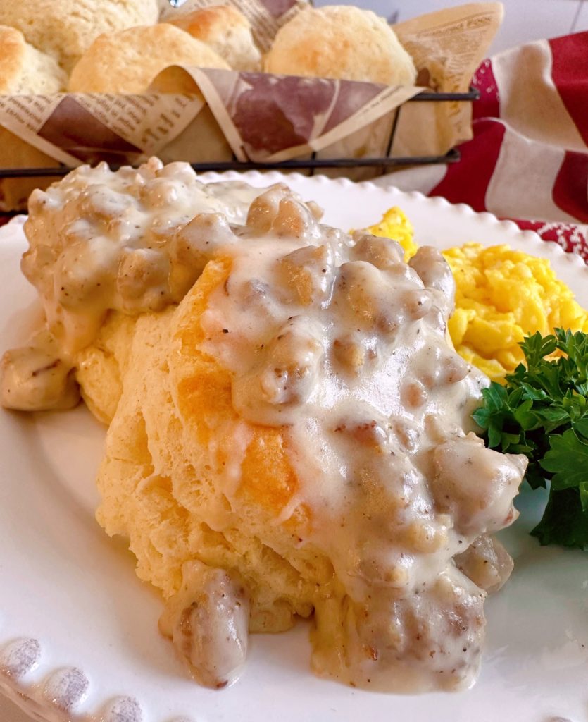 Sausage gravy over biscuits with scrambled eggs.