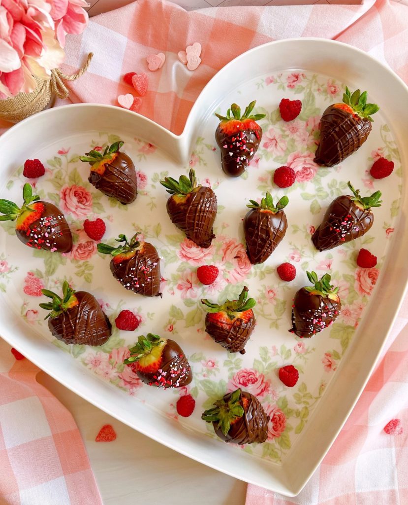 Heart platter full of homemade chocolate strawberries.